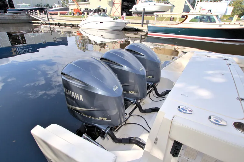 Lucky Penny II Yacht Photos Pics 2018 Grady-White Canyon 376 with triple Yamaha V8 engines docked at marina.