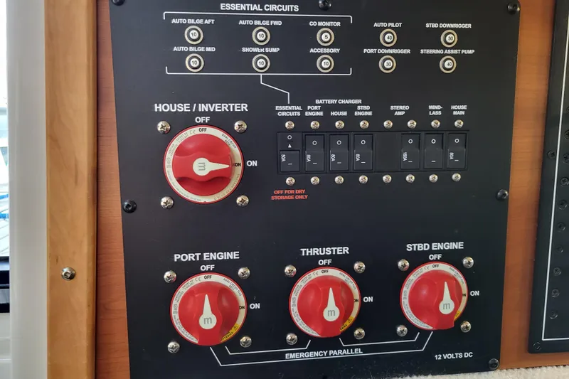 Tranquila Yacht Photos Pics Control panel of 2023 Cutwater C-288 Coupe with switches and dials for essential circuits.