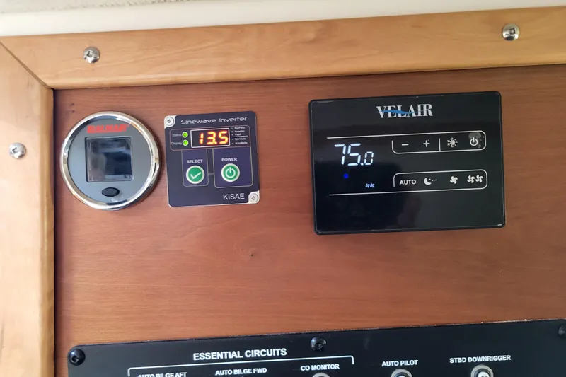 Tranquila Yacht Photos Pics Control panel of 2023 Cutwater C-288 Coupe with inverter and climate settings.
