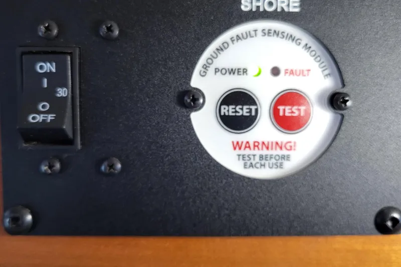 Tranquila Yacht Photos Pics 2023 Cutwater C-288 Coupe ground fault sensing module with reset and test buttons.