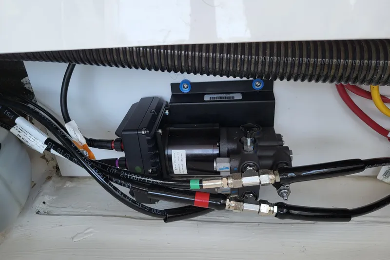 Tranquila Yacht Photos Pics 2023 Cutwater C-288 Coupe hydraulic system with cables and connectors.