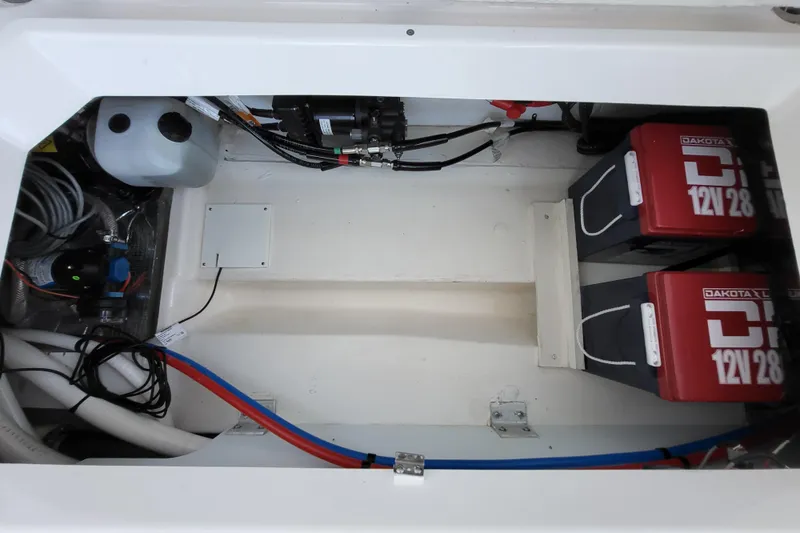 Tranquila Yacht Photos Pics 2023 Cutwater C-288 Coupe engine compartment with batteries and wiring.