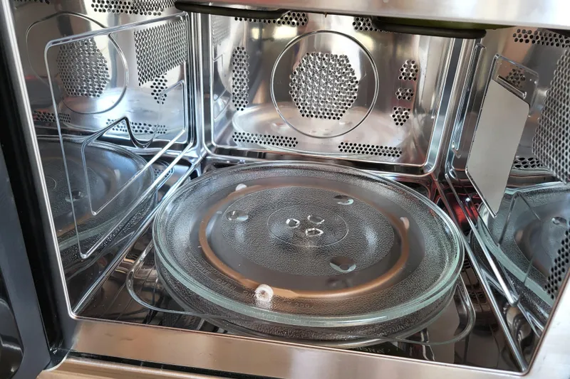 Tranquila Yacht Photos Pics Interior of a modern microwave oven with glass turntable, 2023 Cutwater C-288 Coupe.