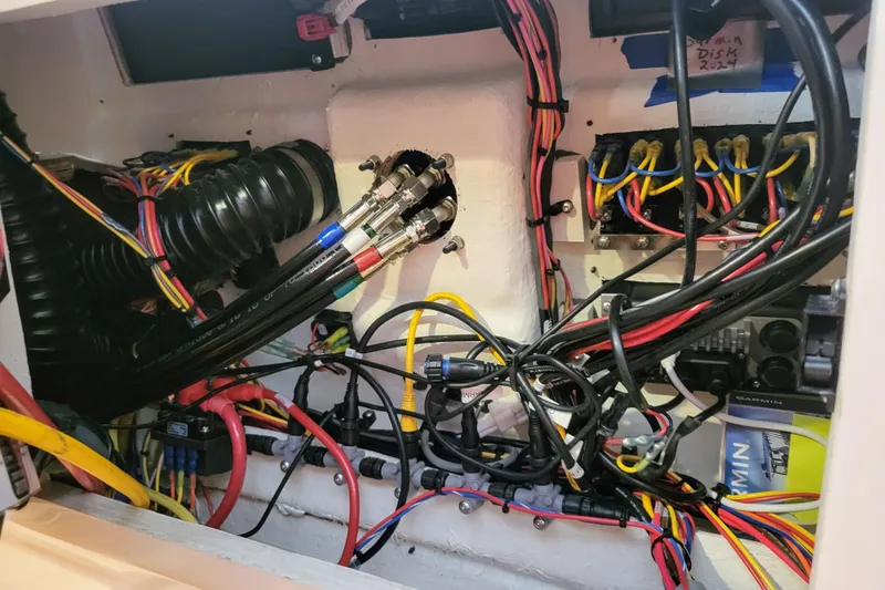 Tranquila Yacht Photos Pics Electrical wiring and components inside a 2023 Cutwater C-288 Coupe boat.