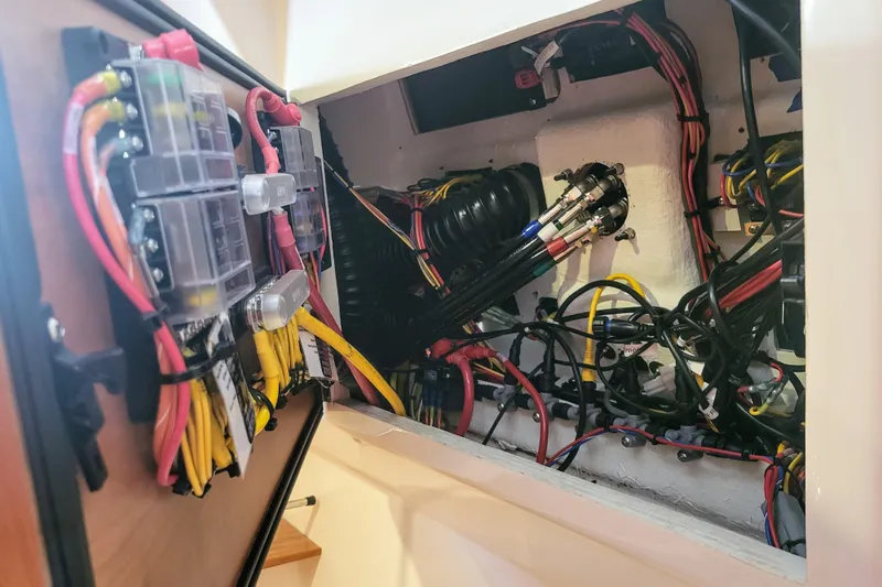 Tranquila Yacht Photos Pics Electrical wiring and components inside a 2023 Cutwater C-288 Coupe boat.