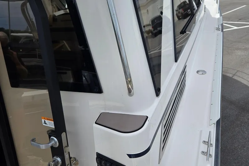 Tranquila Yacht Photos Pics 2023 Cutwater C-288 Coupe boat exterior with sleek design and modern features.