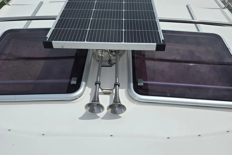 Tranquila Yacht Photos Pics 2023 Cutwater C-288 Coupe boat roof with solar panel and dual horns.