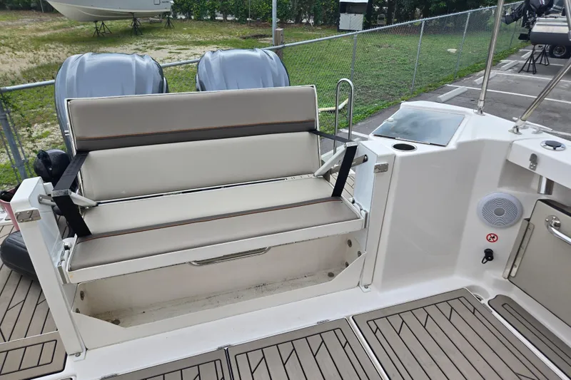 Tranquila Yacht Photos Pics 2023 Cutwater C-288 Coupe boat with foldable seating and dual outboard motors.