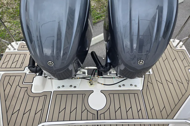 Tranquila Yacht Photos Pics 2023 Cutwater C-288 Coupe boat with dual Yamaha outboard engines on deck.