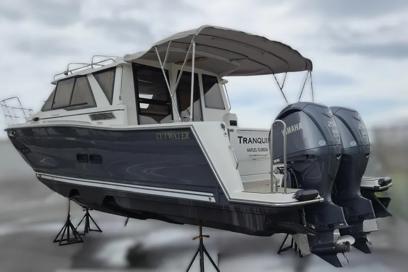Tranquila Yacht Photos Pics 2023 Cutwater C-288 Coupe boat with dual Yamaha engines on display.