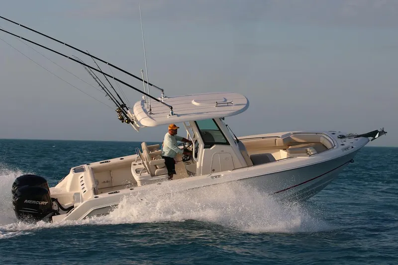  Yacht Photos Pics Manufacturer Provided Image: 2025 Boston Whaler 250 Outrage cruising on open water, showcasing speed and performance.