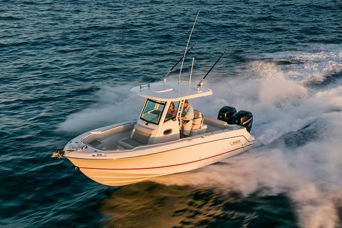  Yacht Photos Pics Manufacturer Provided Image: 2025 Boston Whaler 250 Outrage speeding on open water.