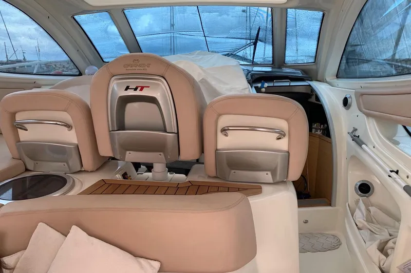  Yacht Photos Pics Interior of 2009 Cranchi Mediterranee 43 HT yacht with beige seating and wooden accents.