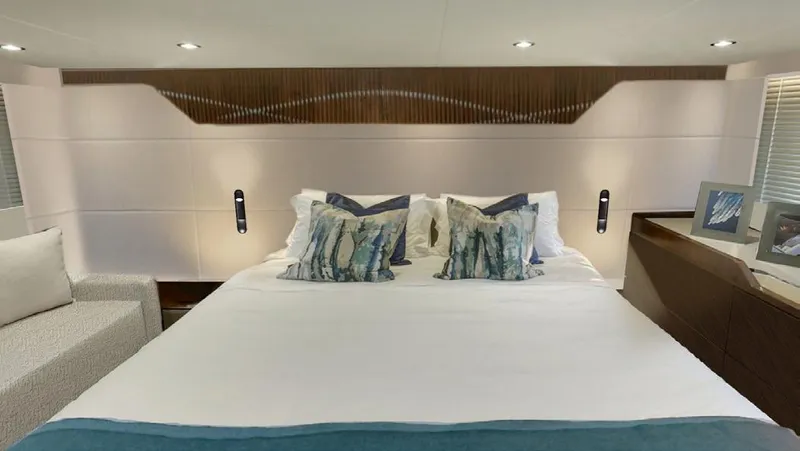 New For 2026 Yacht Photos Pics Luxurious bedroom interior of 2025 Fairline Targa 50 Open yacht with modern decor.
