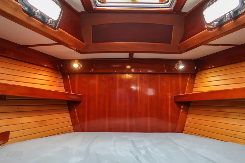 Next Boat Yacht Photos Pics Interior of 2007 Morris Ocean Series 45 yacht with polished wood finish and cozy lighting.