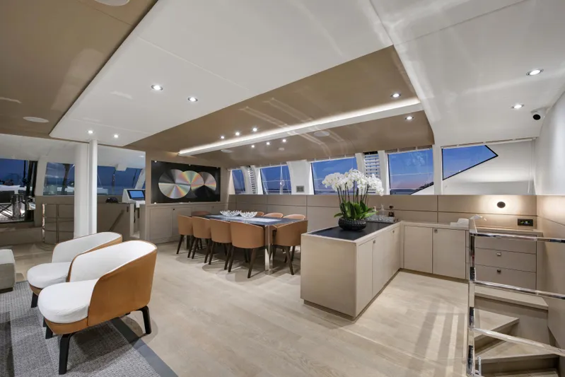 Atlantika Yacht Photos Pics Luxurious interior of a 2013 custom sailing yacht with modern dining area and elegant decor.