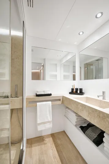 Atlantika Yacht Photos Pics Luxurious bathroom on a 2013 custom sailing yacht, featuring modern design and elegant fixtures.