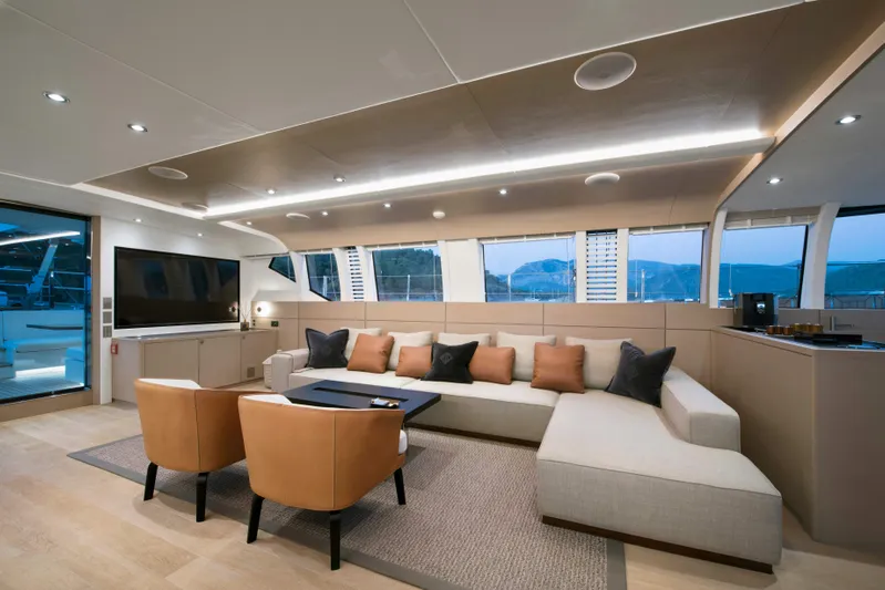 Atlantika Yacht Photos Pics Luxurious interior of a 2013 custom sailing yacht with modern furnishings and large windows.
