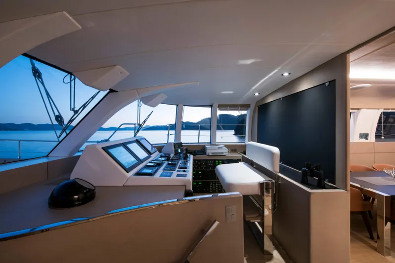 Atlantika Yacht Photos Pics Modern sailing yacht interior with navigation equipment, panoramic windows, and elegant design, 2013 model.