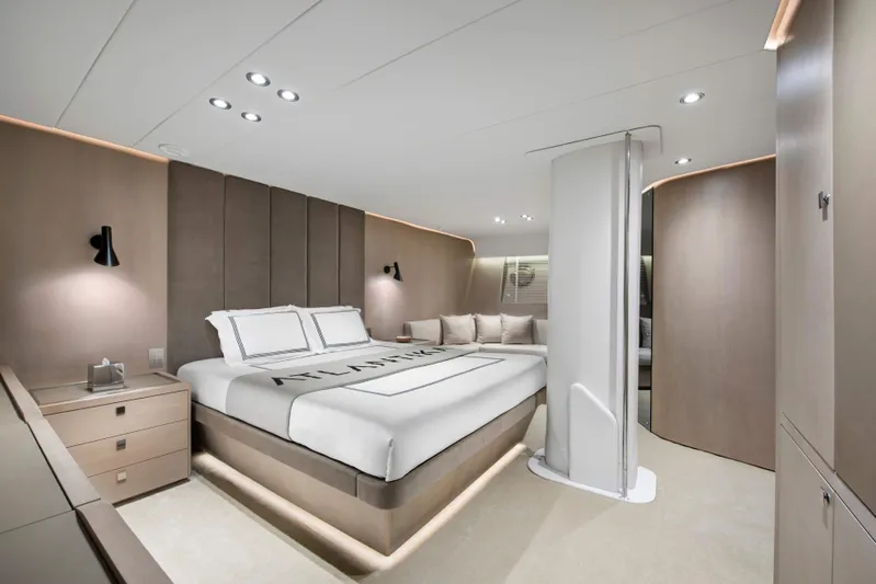 Atlantika Yacht Photos Pics Luxurious cabin interior of a 2013 custom sailing yacht with modern design and cozy bedding.