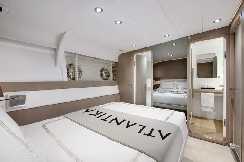 Atlantika Yacht Photos Pics Luxurious interior of a 2013 custom sailing yacht with modern bedroom and bathroom.