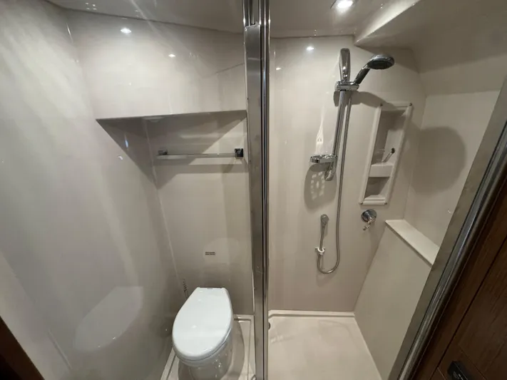  Yacht Photos Pics Bathroom interior of 2015 Cruisers Yachts 48 Cantius with shower and toilet.
