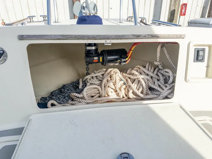  Yacht Photos Pics Storage compartment on 2018 Targa 27.1 boat with ropes and winch.