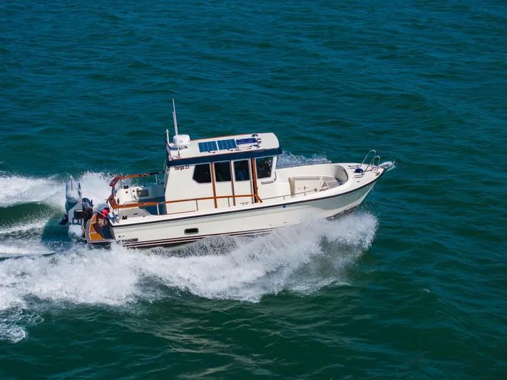  Yacht Photos Pics Targa 27.1 boat cruising on open water, 2018 model.