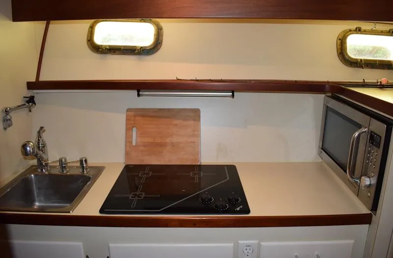 Cygnet Yacht Photos Pics Kitchen area in a 1960 Rybovich Sportfisherman yacht.