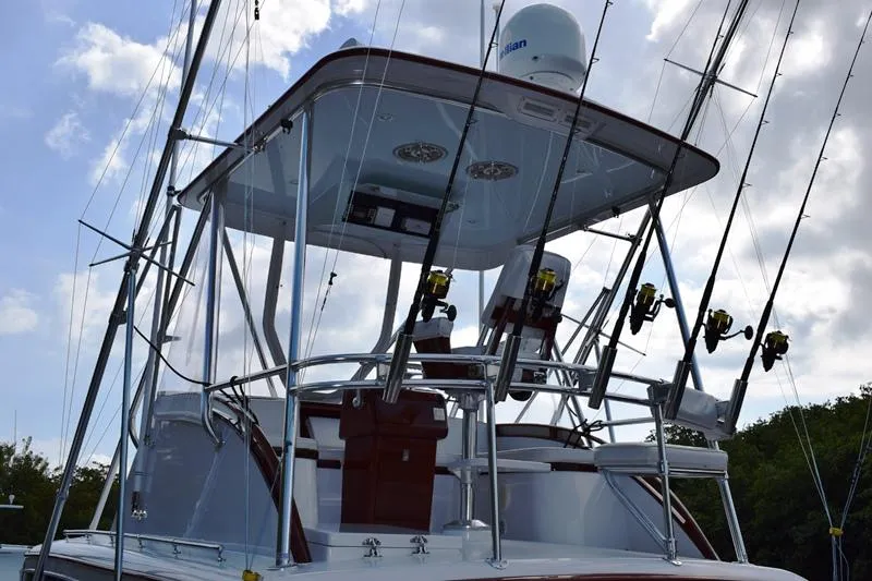 Cygnet Yacht Photos Pics 1960 Rybovich Sportfisherman with fishing rods and equipment.