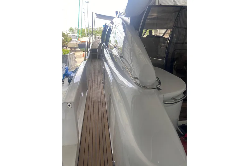  Yacht Photos Pics Sunseeker Predator 80 yacht, 2000 model, featuring sleek deck design and modern amenities.