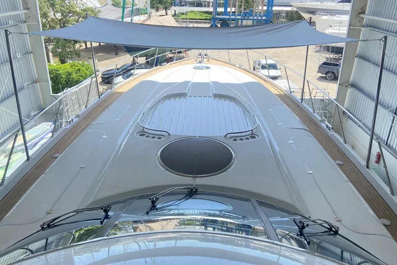  Yacht Photos Pics Sunseeker Predator 80 yacht deck, 2000 model, in a marina setting.