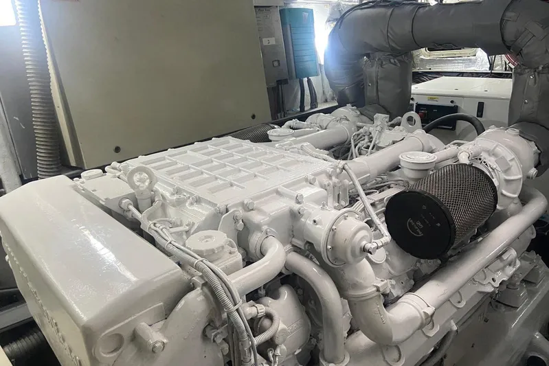  Yacht Photos Pics Engine room of a 2000 Sunseeker Predator 80 yacht, showcasing a powerful marine engine.