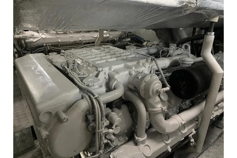  Yacht Photos Pics Engine room of a 2000 Sunseeker Predator 80 yacht, showcasing detailed machinery.