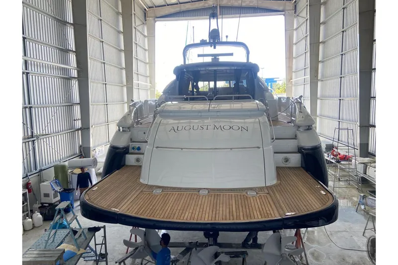  Yacht Photos Pics Sunseeker Predator 80 yacht "August Moon" in a maintenance facility, rear view, 2000 model.