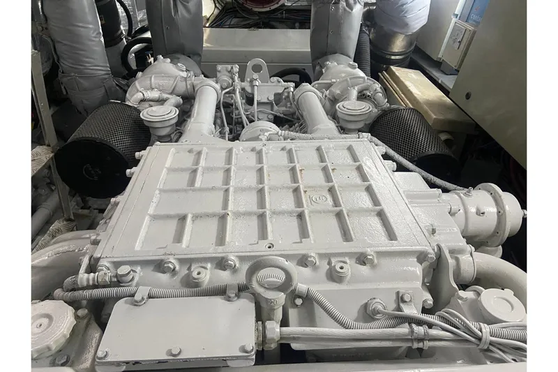  Yacht Photos Pics Engine compartment of a 2000 Sunseeker Predator 80 yacht, showcasing mechanical components.