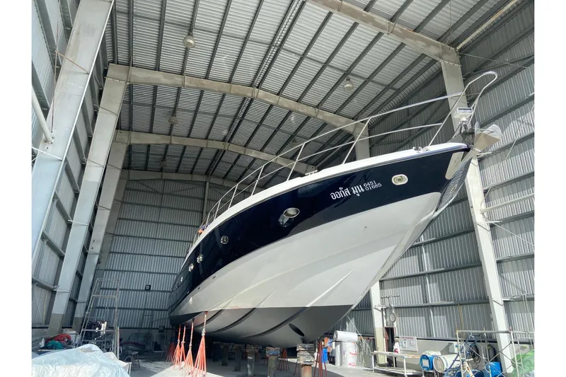  Yacht Photos Pics Sunseeker Predator 80 yacht in a large indoor storage facility, 2000 model.