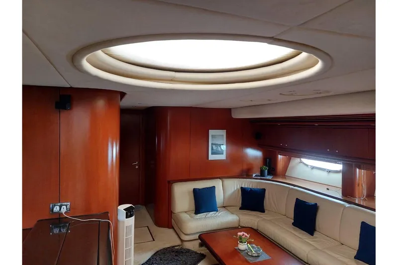  Yacht Photos Pics Luxurious interior of 2000 Sunseeker Predator 80 yacht with elegant seating and modern decor.
