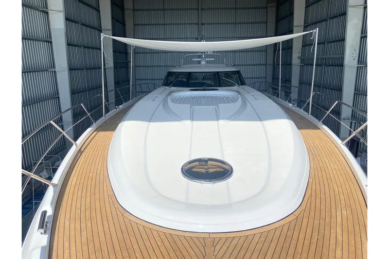  Yacht Photos Pics Sunseeker Predator 80 yacht, 2000 model, with sleek design and wooden deck in storage.