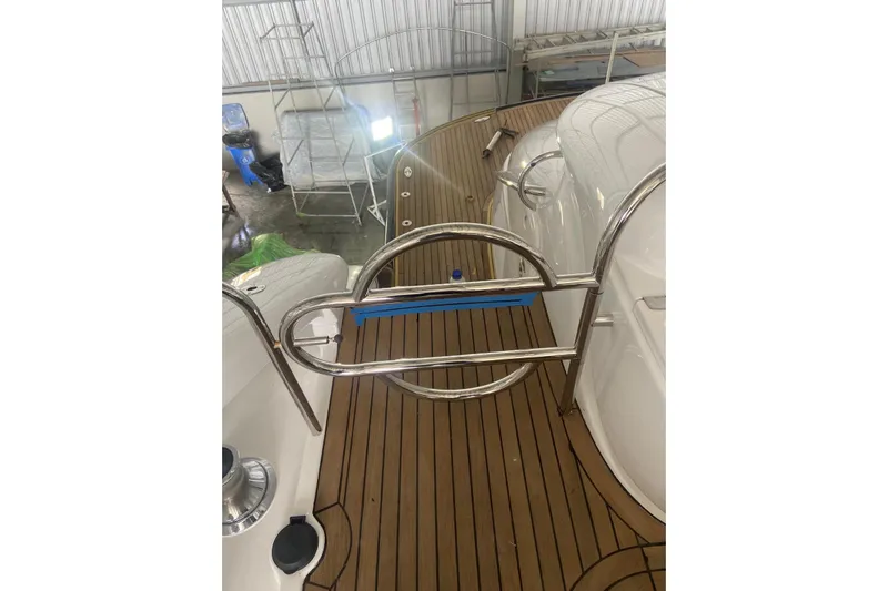  Yacht Photos Pics Sunseeker Predator 80 yacht deck with stainless steel railing, 2000 model.