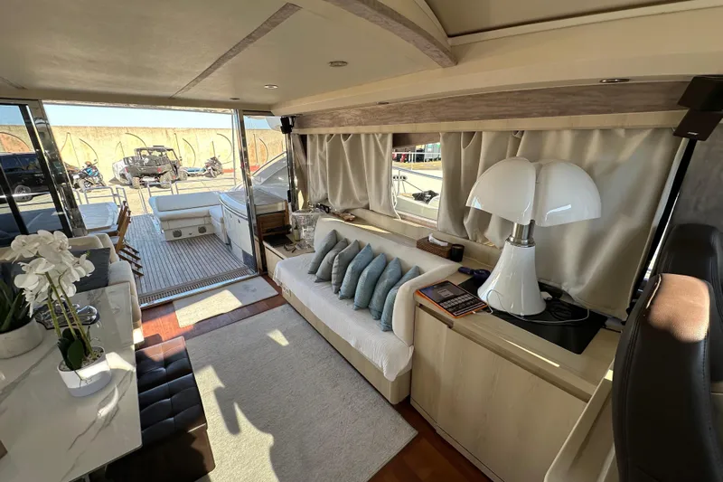  Yacht Photos Pics Luxurious interior of 2006 Princess V70 yacht with elegant seating and decor.