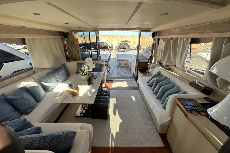  Yacht Photos Pics Luxurious interior of a 2006 Princess V70 yacht with elegant seating and decor.