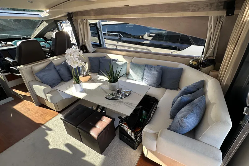  Yacht Photos Pics Luxurious 2006 Princess V70 yacht interior with elegant seating and decor.
