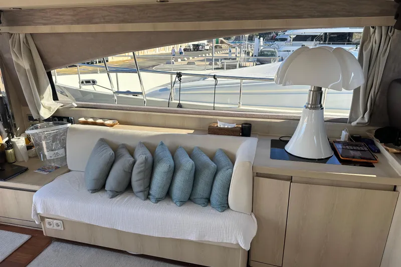  Yacht Photos Pics Luxurious interior of 2006 Princess V70 yacht with elegant seating and modern decor.