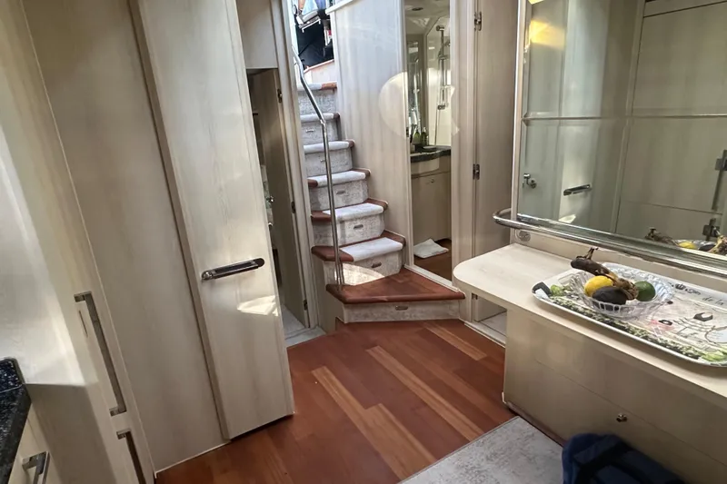  Yacht Photos Pics Luxurious interior of a 2006 Princess V70 yacht with elegant wood flooring and modern design.