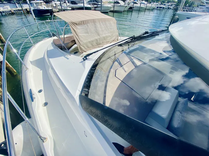  Yacht Photos Pics 2015 Prestige 500 yacht docked at marina, featuring sleek design and spacious deck.