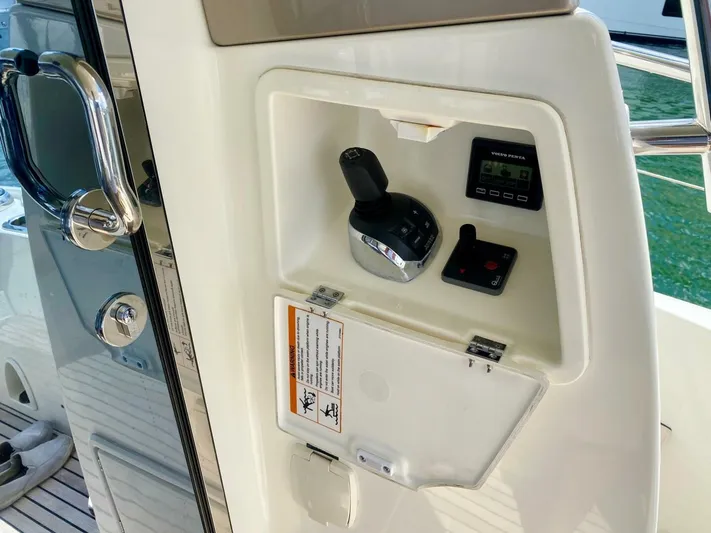  Yacht Photos Pics Control panel of a 2015 Prestige 500 yacht with joystick and display.