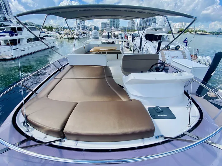  Yacht Photos Pics Luxurious 2015 Prestige 500 yacht with spacious deck and seating in marina.