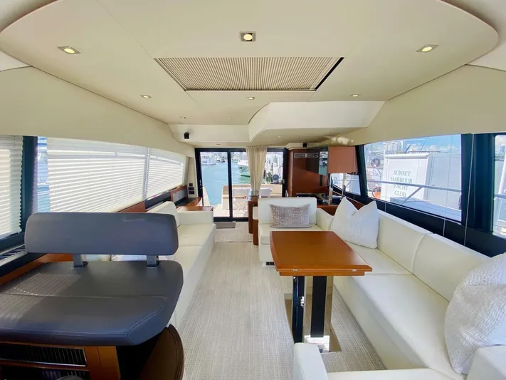  Yacht Photos Pics Luxurious interior of a 2015 Prestige 500 yacht with elegant seating and modern design.