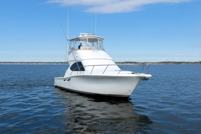 Chasing Tail Yacht Photos Pics 2007 Tiara Yachts 3900 Convertible cruising on open water.